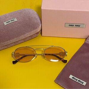 Miu Miu Gold Sunglasses with Amber Lenses